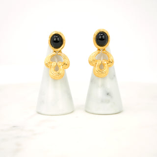 Baroque “Door Knocker” Earrings  Designer: Givenchy  Material: gold plated metal, faux onyx cabochon  Period: 1980s. New old stock. Available at Fonfrege.com
