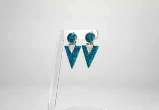A beautifully geometric pair of art-deco earrings, made from composite turquoise and sterling silver (925). Marked Mexico, they are most likely from Taxco.
