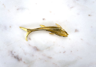 Gilded Koi Brooch Pin. Designer: Monet Period: 1970s Dimensions: 3.25” Material: 18k gold plated Condition: Excellent  A symbol of good luck and perseverance in most Asian cultures, this Koi makes a leap forward. Exquisitely detailed scales and fins. Available at Fonfrege.com